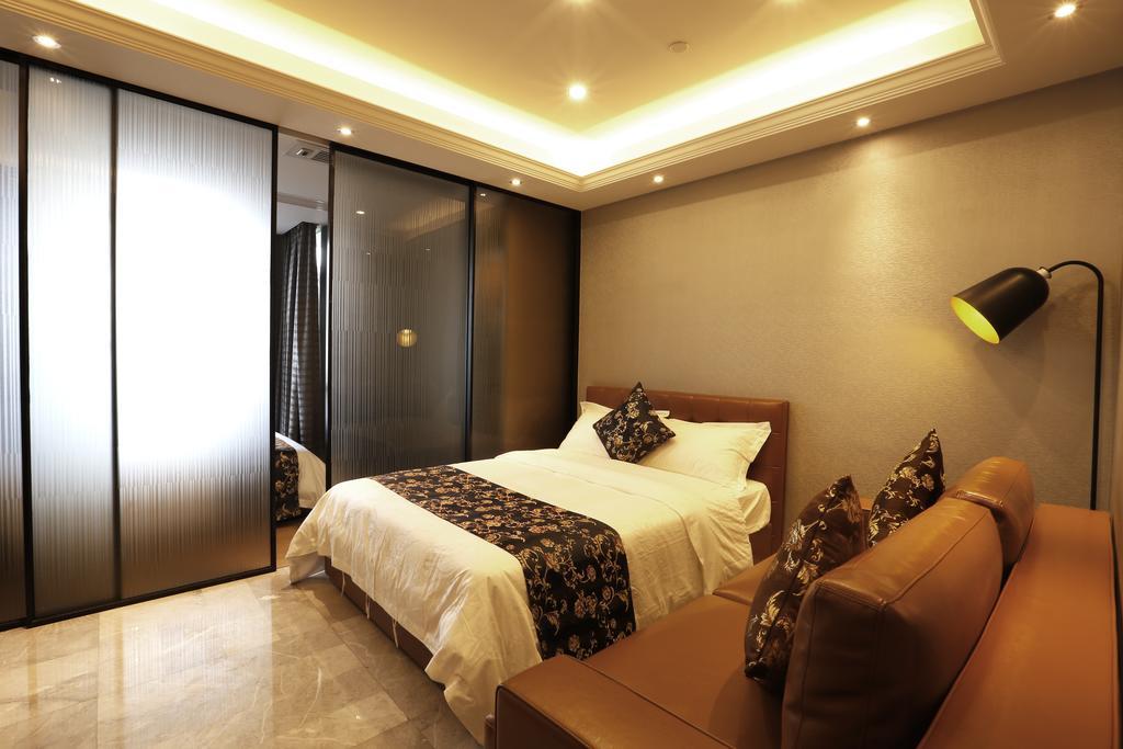 Boman Holiday Apartment Bei Jing Lu Jie Deng Du Hui Branch Cantón Exterior foto