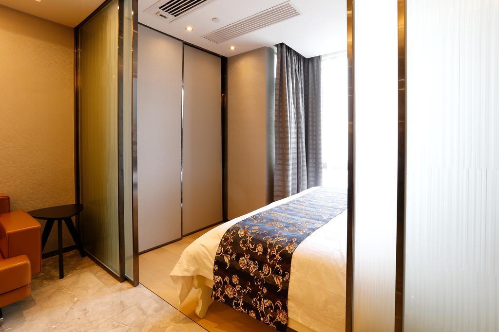 Boman Holiday Apartment Bei Jing Lu Jie Deng Du Hui Branch Cantón Exterior foto