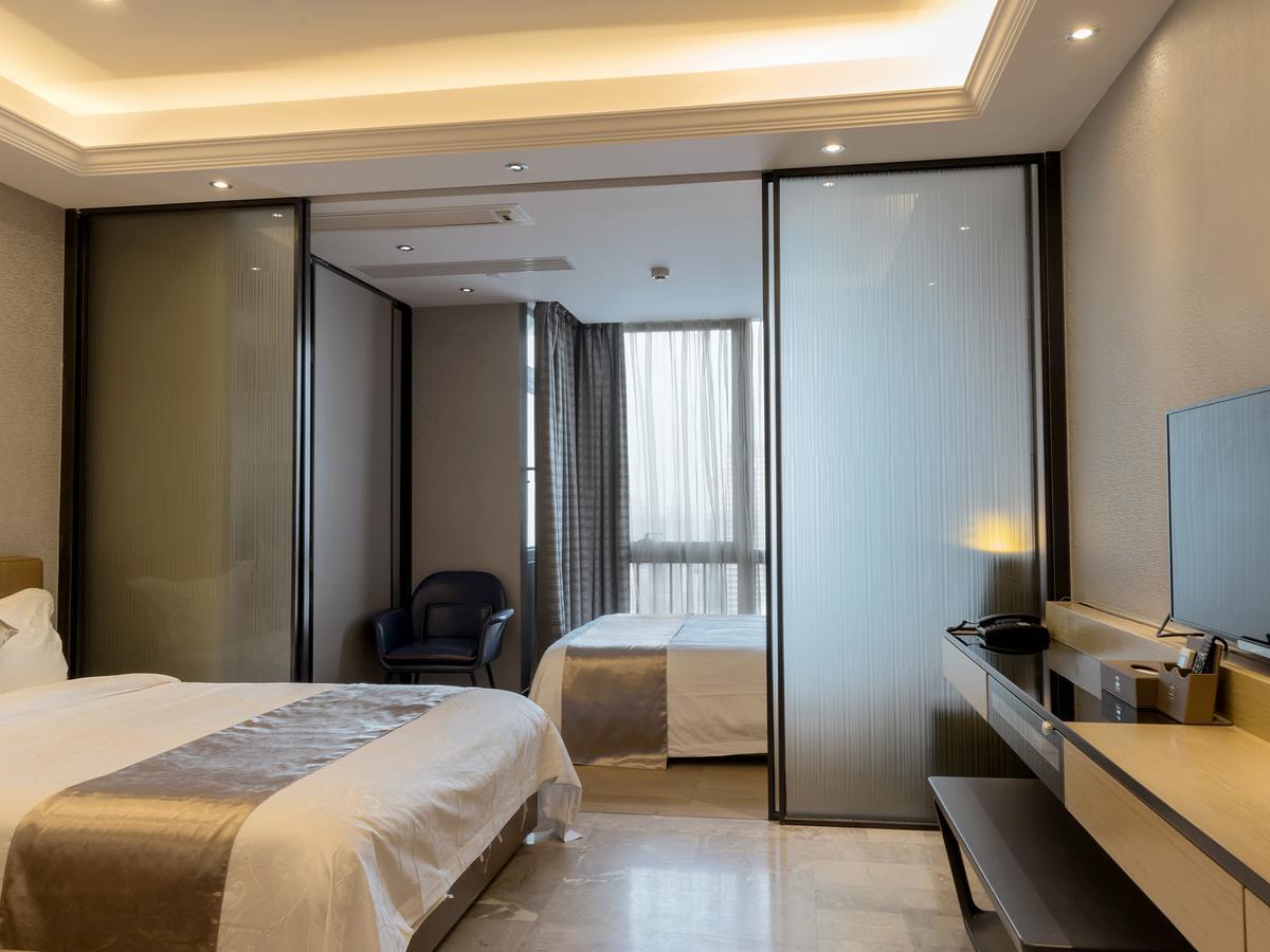 Boman Holiday Apartment Bei Jing Lu Jie Deng Du Hui Branch Cantón Exterior foto